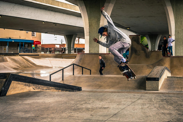 Skateboarder Doing a trick at a skatepark