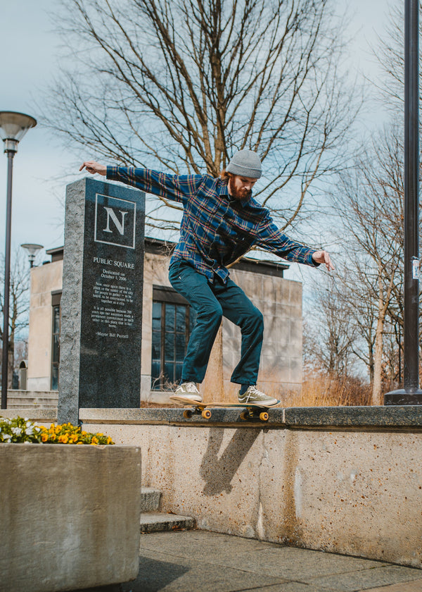 Skateboarder doing a nose slide