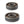Two metal bearings stacked vertically on a white background, one labeled ZION and the other JUPITER Zions home town. Both showing orange inner accents.
