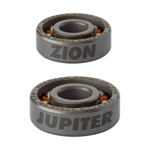 Two metal bearings stacked vertically on a white background, one labeled ZION and the other JUPITER Zions home town. Both showing orange inner accents.