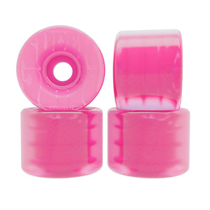 Four translucent pink, oj super juice mini  skateboard wheels. Soft 78a cruiser wheels