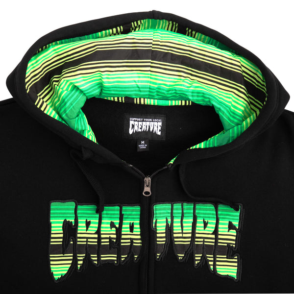 Creature Serape zip hooded sweatshirt black green close up image