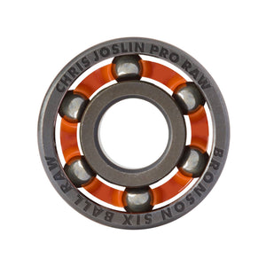 Close-up of a skateboard bearing with 'Chris Joslin Pro Raw' branding on a white background