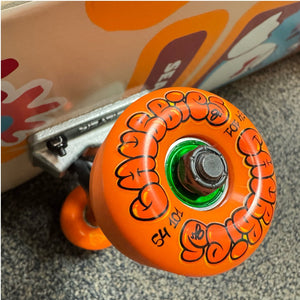 close up of orange oj 54mm chubbies wheels