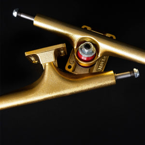 Independent Stage 4 Gold skateboard trucks with red 90a cushions set image