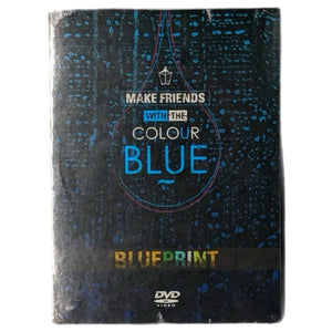 A DVD box set for 'Make Friends with the Colour Blue Blueprint' on a plain white background. The cover features a dark blue and black textured pattern with a blue teardrop graphic, gold and white text, and a DVD logo at the bottom.