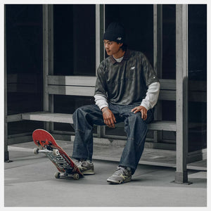 skater wit new balance numeric 770 grey days colorway on