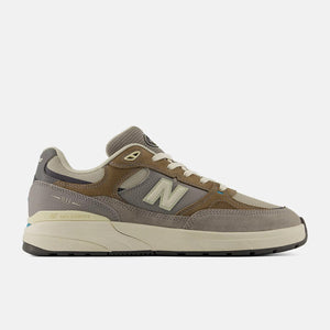 grey and brown new balance numeric side image