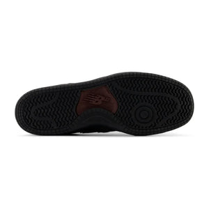 Outsole of New Balance Numeric 480 x Gore-Tex skate shoe, black rubber with herringbone tread and red New Balance logo