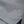Close-up of any sweat storm  blue striped fabric with 'Dark Seas' logo.