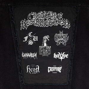 patch image Creature Resurrection Denim Vest with quilted flannel lining, applied printed twill back patch, welt pockets, interior patch pocket, and matte black hardware.