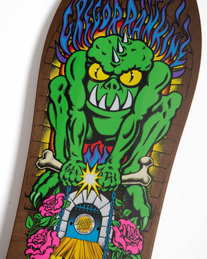 Close-up of Jim Phillips Rankine Monster artwork on the brown-stain Santa Cruz reissue skateboard deck