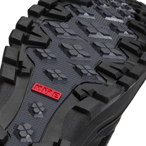 Close-up of the lugged outsole tread and red MTE logo on Vans Sk8-Hi GORE-TEX Insulated MTE Black/Black