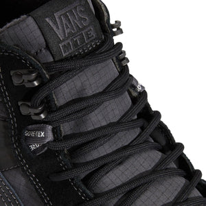 Close-up of the padded tongue, black laces and metal lace hooks on Vans Sk8-Hi GORE-TEX Insulated MTE Black/Black