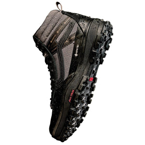 Vans Sk8-Hi GORE-TEX Insulated MTE Black/Black at an angle, showing water droplets on the upper and the lugged outsole