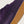 Close-up of purple suede, DURACAP reinforcement and gum sole on Vans Skate Half Cab shoes