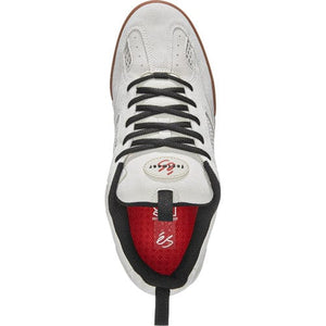 White sneaker with black accents top view on a white background